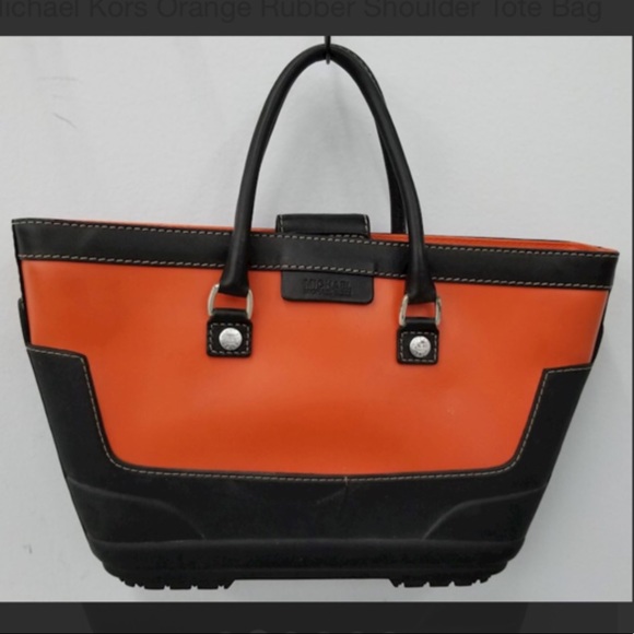 Michael Kors Handbags - Michael Kors Rubber Botton Purse